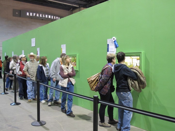 Thousands of people stand in line to view the Miniature Settings
